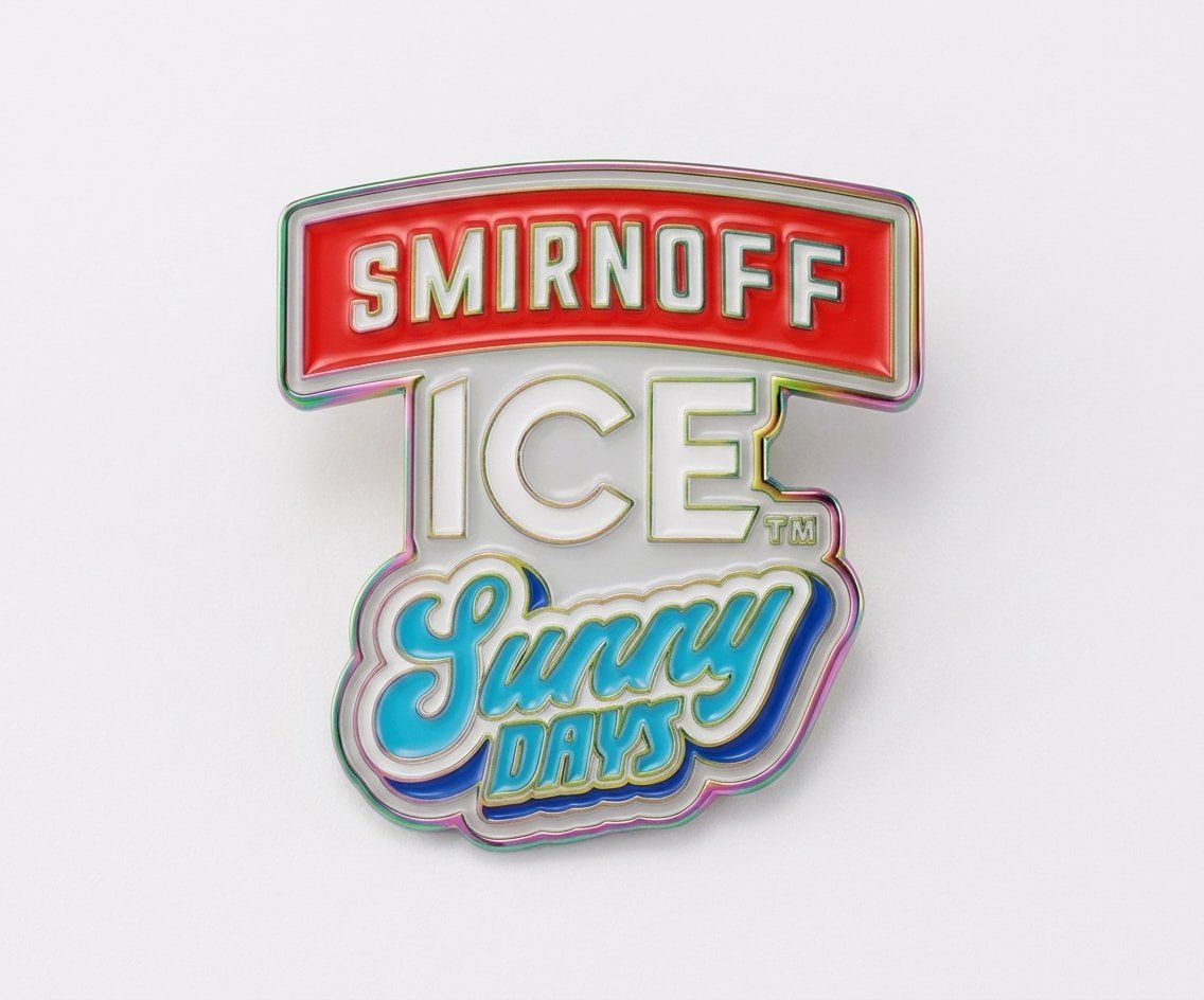 Custom hard enamel pins arranged for B2B product selection